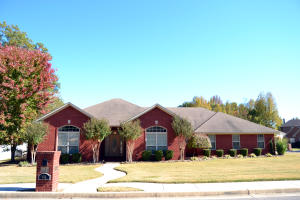 Everything you want - HERE!  Pool, new alarm system, luxurious remodeled master bathroom, built in stereo receiver with surround sound, flat screen wall-mounts (even on the back patio), cat-5 plugins for smart t.v. and whole home networking, granite counter tops, hand scraped wood floors, corner lot, covered back patio for grilling, vaulted ceilings in the master bedroom, 2 car garage and plenty of space for the entire family!Schedule your preview today!!!
