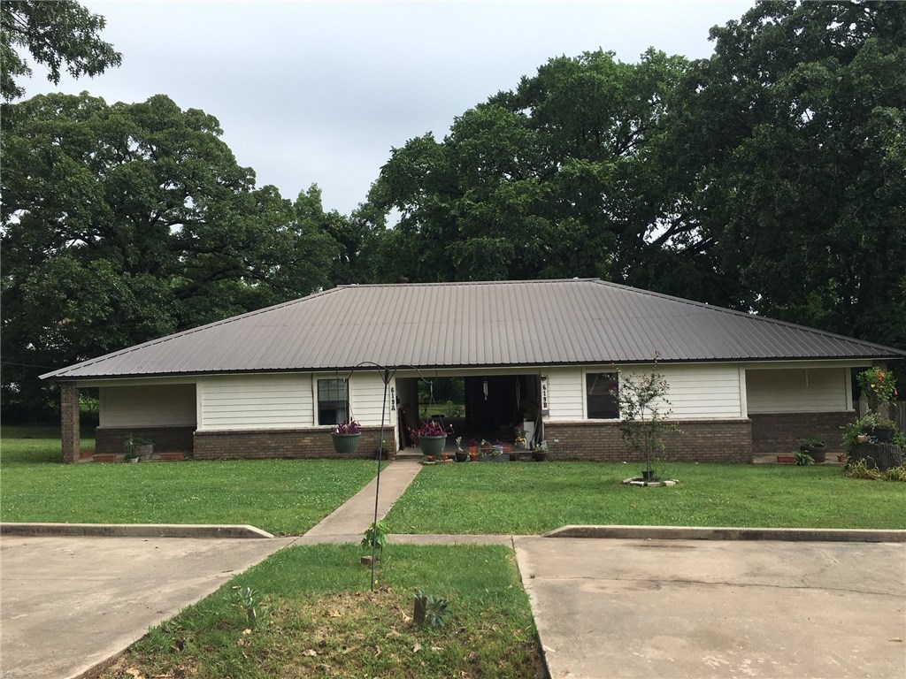 Two bedroom two bath on each side.  Covered breezeway connects the two units.  Located close to downtown.