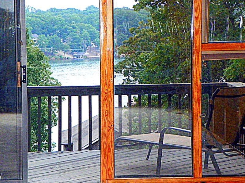 Updated, contemporary 3 BR, 2 Bath home with stunning panoramic year round views of Lake Loch Lomond! Close to Bypass &  a mi. from Stoneykirk Boat Ramp. Glass SunRoom, Native Stone fireplace, lg. Kitchen, circle drive, Garage & det. Carport, Decks, Workshop, Shed & Patio! Tremendous grass yard with sun & shady areas. Nestled among much larger, more expensive beautiful Lake homes! All appliances & ready for occupancy In just a few days! Call NOW for more info. Agent-owned.