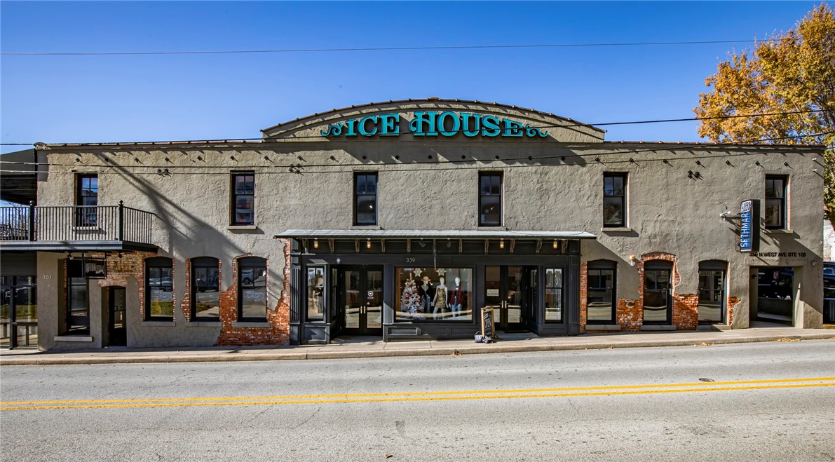 Own a piece of history with this one of kind commercial opportunity located in downtown Fayetteville inside the entertainment district known as ORA. One block from campus with views of old main, this building has a current CAP of 6.57%. See attached Proforma. 3 highly visible commercial units with road frontage located in the heart of the Entertainment District by Dickson Street with three long term tenants. This building is beautiful and must see in person. 18 parking spaces deeded with the sale. Recently approved Civic Plaza Shopping and parking deck as part of the Cultural Arts Corridor Project and shopping is going in behind the building. Maintenance is shared with the POA. Completely remodeled in 2004. Agent to be present at all showings. See attached documents.
