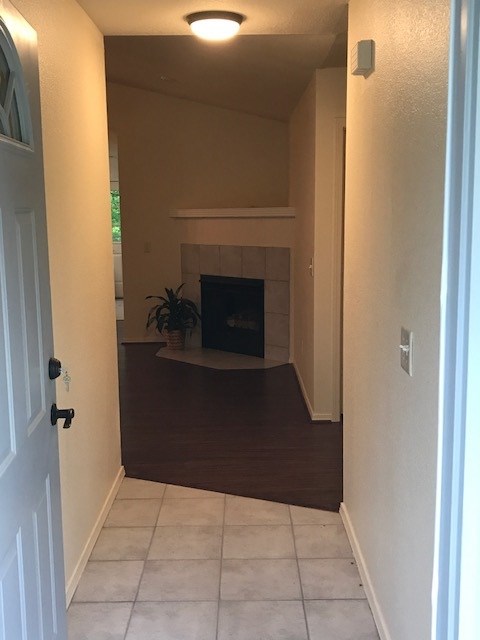 Location! Location! Location! Just a block away from WalMiart Home Office! This won't last long! Property features vaulted ceilings, ceramic tile, gas log fireplace, covered patio and a fenced in back yard all sitting on a large corner lot. Remodeled in 2017 with all new appliances, paint and flooring.