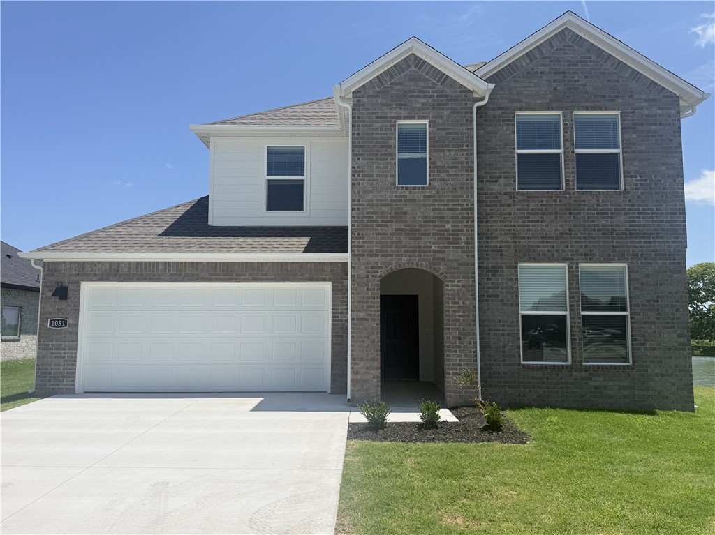 Sold before print! Notable Naples plan in Huber Place in Bentonville, AR! Each home will feature a modern electric fireplace with a poplar mantle and LVP flooring throughout the first floor with carpet on the stairs and upstairs. You’ll find a ceiling fan in all bedrooms and the living room! These homes will be complete with quartz kitchen counters, 42-inch cabinets, and stainless-steel appliances! Primary bath features quartz counters, double sinks, and a walk-in shower! The secondary bath will have a walk-in shower; third bath will have a tub/shower combo. The Naples plan includes a game room upstairs! Home will have a Garage Door Opener, landscape package, with Brick and Hardie® exterior per plan. These 2 Story homes will have a combination of Brick and/or siding on the front, sides and back. Homes in Huber Place are located within the city limits of Centerton with a Bentonville address and zip code of 72713. Property owners are considered a citizen of Centerton and all that applies. Subject to change.