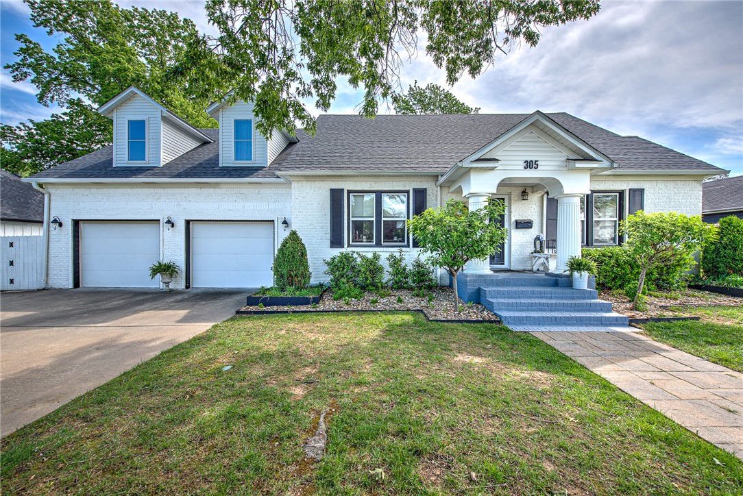 Tucked into the heart of downtown Bentonville, this exceptional property blends comfort, style, and an unbeatable location. Situated on a rare 0.4-acre lot, the home offers a private backyard retreat designed for both relaxation and entertaining. Enjoy the stunning in-ground pool, unwind by the outdoor fireplace, and take in the expansive green space—perfect for gatherings or quiet evenings under the stars. Inside, the thoughtfully designed split floorplan provides both functionality and privacy, making it ideal for families or hosting guests. Spacious living areas flow seamlessly, creating an inviting atmosphere for everyday living and special occasions alike. Just minutes away by foot or bike, you’ll find yourself immersed in the vibrant energy of downtown Bentonville, with easy access to dining, shopping, trails, and all the attractions surrounding the Bentonville Square. This is more than a home—it’s a lifestyle opportunity in one of Northwest Arkansas’s most sought-after locations.