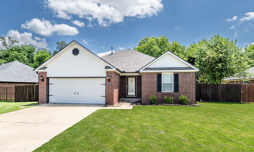Imagine being able to walk your kids to school, or get to I49 or the local grocery store in less than 5 minutes. This beautiful home is located in a charming subdivision and offers the perfect combination of convenience, comfort, and value. With its great location, thoughtful updates, and inviting outdoor space, this is a home you won't want to miss! The large back deck overlooks a nicely sized back yard with plenty of room for fun. There is a beautiful Pin Oak tree that offers a tremendous amount of shade and the yard is ready for your personal touch. Recent updates include a new roof, siding, interior paint, LVP throughout, and new lighting in key areas, this home is sure to please.