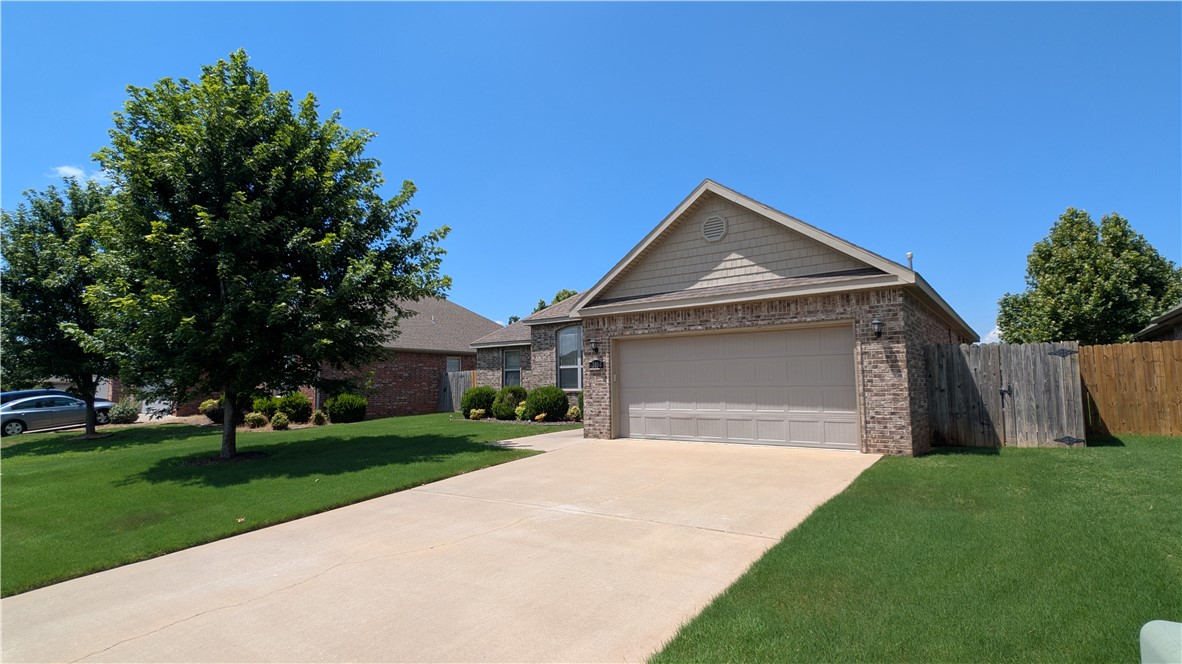 This 4-bedroom, 2-bath rental at 3104 SW Wargate is perfectly positioned in the heart of Bentonville. Located just minutes from the Walmart Home Office, this home provides quick access to everyday essentials, major employers, and the vibrant dining and entertainment options that define the Bentonville lifestyle.  Designed with modern living in mind, the open-concept layout creates an inviting space for gatherings, featuring high ceilings and a seamless flow between the living areas. The kitchen serves as the heart of the home, equipped with quality finishes and ample storage, while the primary suite offers a private retreat complete with a spacious walk-in closet and an attached bath featuring both a soaker tub and a separate shower. Outside, the fully fenced backyard provides privacy and a perfect setting for outdoor enjoyment. This home is ideally situated for those seeking a move-in-ready experience that puts them close to schools, trail systems, and all the amenities that make Northwest Arkansas sought-after.