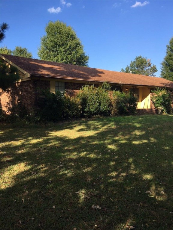 Great location, small acreage, shop, 3 bed 3 bath 3 car garage. Needs some updating & tender loving care.
