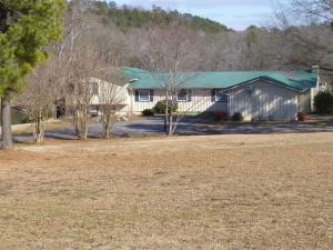 Nice Lakefront home. Excellent location. Needs some TLC. Almost 2500 square feet. Nice screened-in porch overlooking Lake Dardanelle.