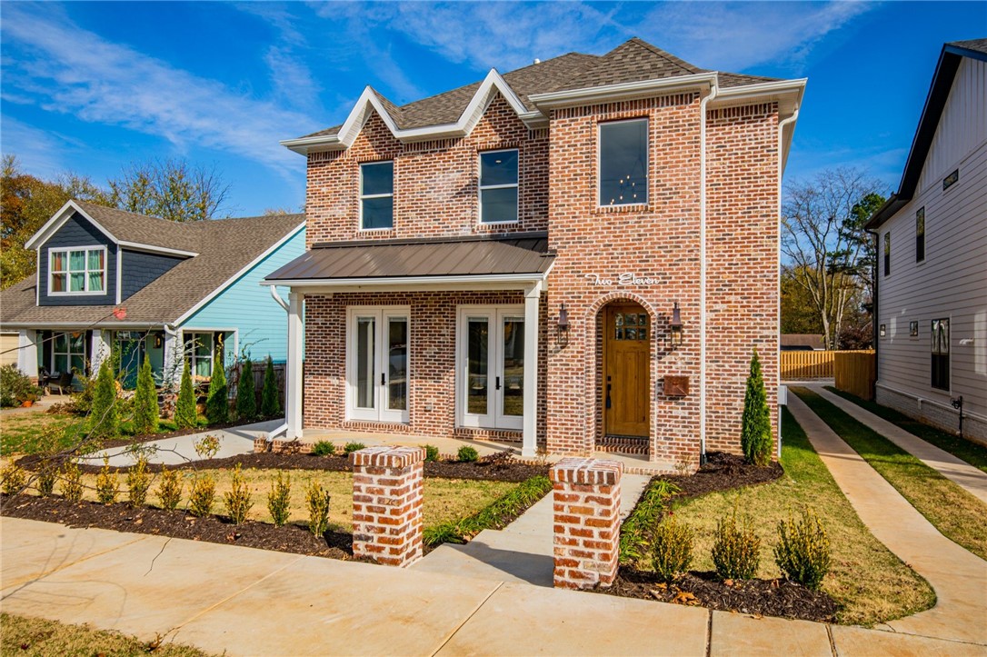Just finished! Move-in ready home walking distance to the square, WMHO, & upcoming 8th St. Gateway Park, High-end finishes, open living area, 2 fireplaces, floor to ceiling cabinets, 10 ft island, 4 patios, and GREEN features.