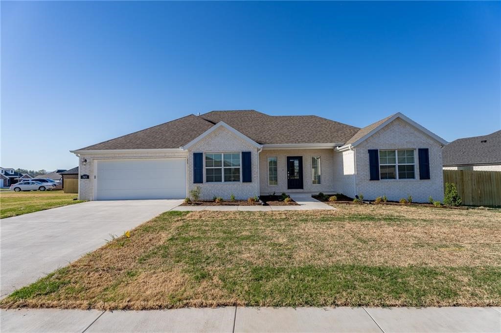 BRAND NEW RENTAL HOUSE, Three bedroom, two bath home. The home has an all-brick exterior and covered back patio on a corner lot. This open floor plan is elevated with upgrades that include quartz countertops throughout, heavy glass walk-in shower in master bathroom, walk-in closet, beams in master bedroom, and double vanity sinks and comes with a Washer/Dryer/Fridge. It is minutes away from Walmart Neighborhood Market, and a variety of restaurants. Future phases will feature walking trails, and a park.