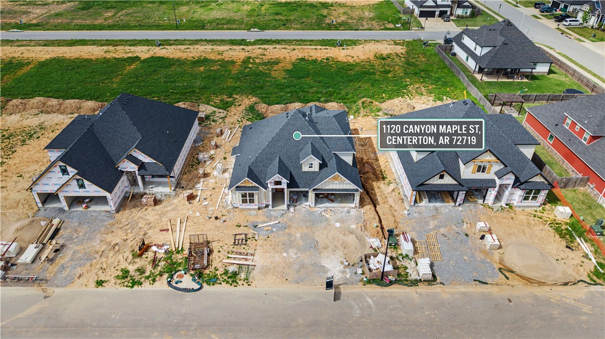 Welcome to the Bella plan — a spacious and well-designed two story south facing home offering 2,746 sq ft of living space. LOT 146. In process of construction and set to be completed around July 15, 2026.  This plan offers 4 bedrooms, 3 bathrooms, plus a bonus room. Gorgeous engineered wood flooring and wood beams in the vaulted living area and the master bedroom. Additional highlights include a covered back patio with a convenient storage room and a three-car garage. Gutters, fence, and blinds included in the price!  Walkable to Centerton Little League, Centerton Gamble Elementary, and Bentonville West High School. Community Pool and Clubhouse for your enjoyment. Introductory pricing for a very limited time. Pricing will go up soon. Contract today!