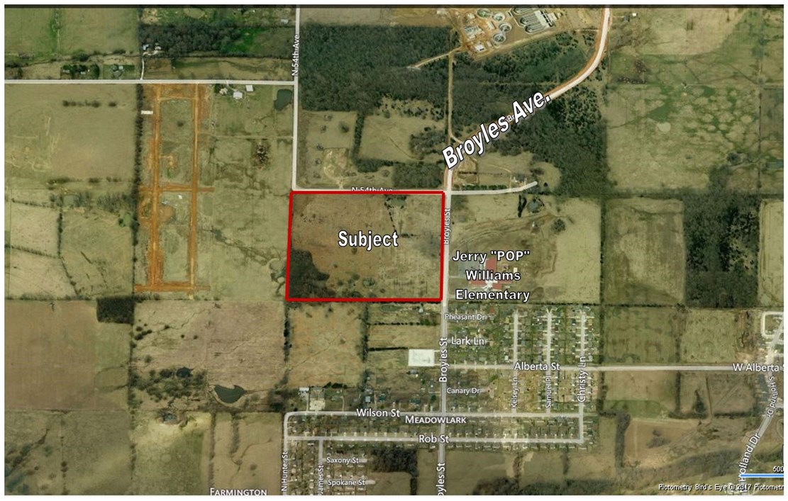 Fantastic opportunity on this 40 acre parcel in Farmington's phenomenal growth area. Flat, level & located across the street from Jerry "Pop" Williams Elementary School. Major corridor between Fayetteville & Farmington.