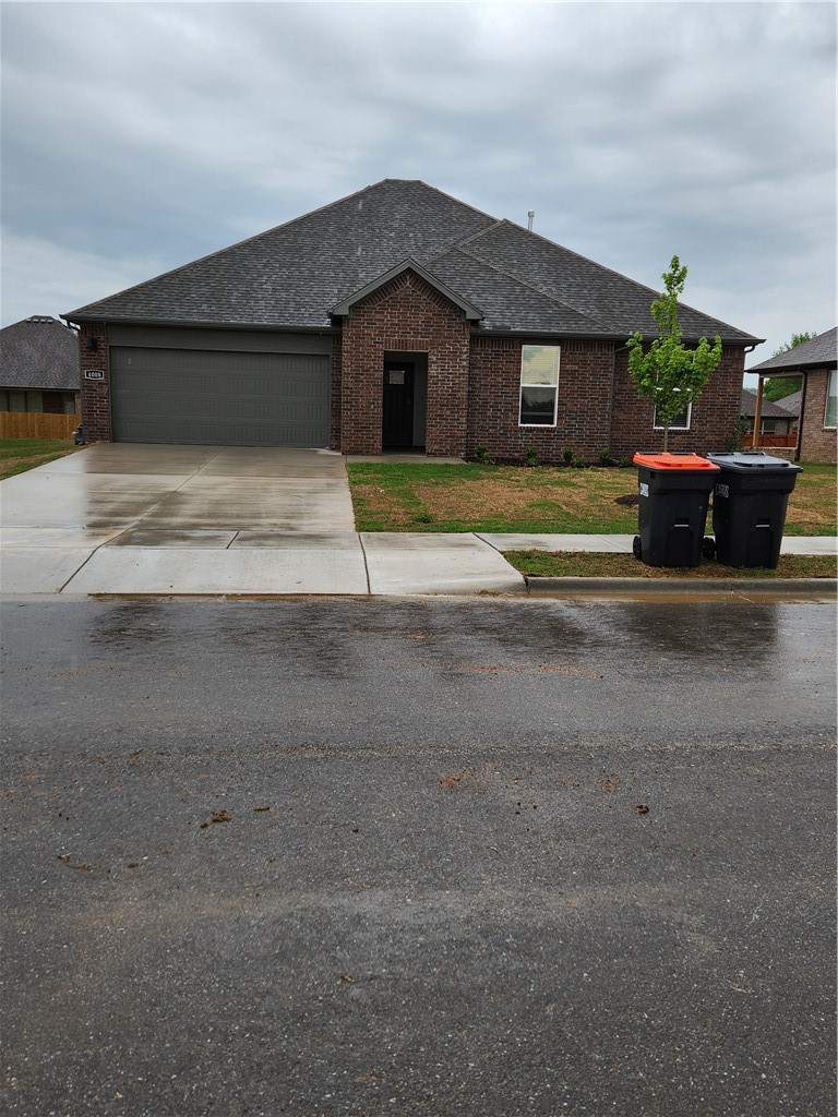Lease $1950.00 Security Deposit $1950.00 Brand New 3 br 2 bath Kitchen is open to the living room. This home boasts gorgeous quartz kitchen countertops, stainless steel appliances, cozy Electric fireplace, and Luxury Vinyl plank flooring throughout! Primary bath has an oversized shower, walk in closet and dual sinks with quartz countertops. Covered patio and  privacy fenced backyard. Tankless hot water heater! Located close to the C.L. "Charlie and Willie George Park that consists of walking trails, dog park, splash pad, ball fields, and tennis courts. Easy access to the Don Tyson Parkway. Pets negotiable $300.00 Pet Deposit and $50.00 monthly Pet Fee. All occupants 18 years and older $35.00 credit/criminal history fee