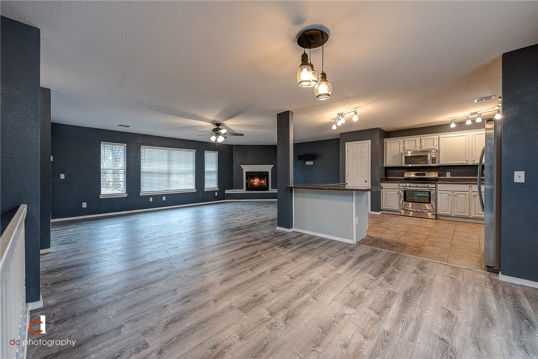 Walking distance to the Downtown Bentonville Square, bike trails, Crystal Bridges and much more! Your new home has newly remodeled flooring, cabinets, and lighting! You'll LOVE the open and spacious living room, dining room and kitchen and also the space that can be used as an office off the garage!! All of this nestled on 1/2 acre lot!! Don't wait, see it TODAY!