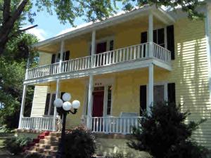 National Register of Historic Places announced the acceptance of the Taylor Hill Hotel on October 31, 2008. Now offered to the public this 10 roomHotel dates back prior to 1884. The building is a good example of Folk Victorian architecture. During the boom days of mining in Coal Hill the railroad was across the street from the hotel. Convicts were taken across the street at this time to be fed. Doctors traveling through on the rail roadwould set up shop to care for the sick as well. Much of the structure is basically is in its original state with the acceptation of a few recentimprovements. The current owner has improved the property from its foundation to the downstairs electrical and plumbing keeping its originalintegrity at heart. The upstairs have been stripped down to the or