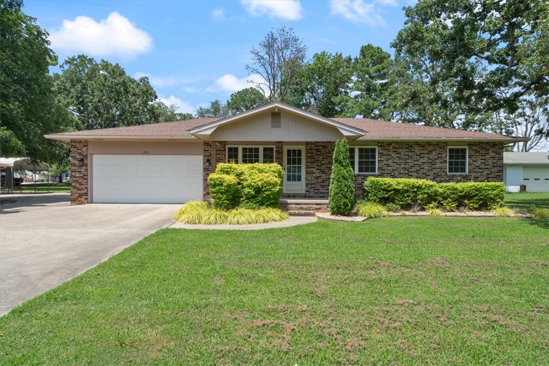 Enjoy the perfect blend of convenience and country living—just 5 minutes from town, yet tucked away on a peaceful property that feels like your own private retreat. This beautiful 3-bedroom, 2-bath home also includes a 722 sq. ft. mother-in-law apartment, ideal for guests, multigenerational living, or potential rental income. 2 car garage on main home and 2 car garage on ADU.  It also  has a spacious 577 square foot shop.  Situated on over an acre just minutes from Lake Elmdale, the property features a park-like backyard perfect for relaxing or entertaining. The home has been thoughtfully updated with kitchen countertops, backsplash, light fixtures, and paint (2021), a new water heater (2024), and new  microwave (2026). All kitchen appliances in the main home, along with the storage building and carport, convey with the property.
