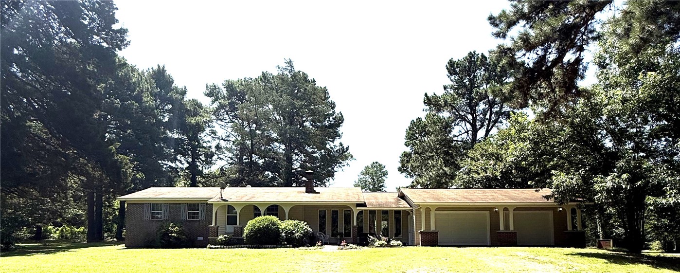 Seller will pay up to $15,000 roof allowance or put a new roof on after closing for new buyer. with an acceptable offer
Introducing a stunning 2-bedroom. 2- bathroom residence nestled in the highly desirable Crow Mountain area. This exceptional home boasts a welcoming living room accentuated by a charming wood stove fireplace, perfect for cozy evenings. Step into the expansive bonus room, adorned with brand new flooring that adds a touch of elegance. 
The kitchen comes equipped with all appliances to inspire your inner chef. Enjoy the great outdoors from the comfort of a large, covered deck in the back, ideal for entertaining or peaceful relaxation, while a cozy covered porch graces the front inviting guests to unwind.
For garden enthusiasts, the previous owners cultivated one of the finest gardens in the neighborhood. offering a fantastic opportunity to continue this legacy! Additionally, the property includes out buildings for storage. 
Don't miss your chance to own this remarkable home in an idyllic setting!
