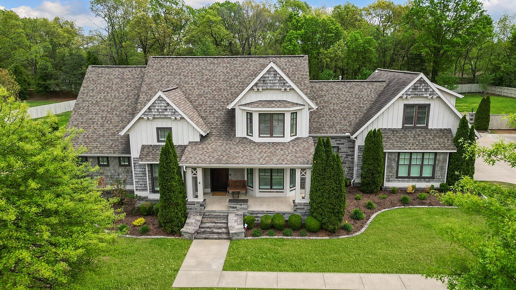 Check out this Car Lovers Dream w/ a  total of 7 Car Bays! 3-bays attached to home. Added the custom detached 4-bay garage w/car lift, heat & cooled, polished concrete floors & upstairs loft! This immaculate home in desirable Bridlewood Estates, is nestled on 2 private & beautifully landscaped acres. Main level has  2 primary suites, each w/ full bathrooms, large walk in closets, built in storage. Dedicated office & formal dining room, 1/2 bath. Thermador appliances, quartz counters, custom cabinetry, separate pebble ice machine, Eat in kitchen looks out to lovely landscaped backyard. Vaulted ceiling in living room w/ built-ins, electric fireplace. Sliding doors go out to enclosed All season patio w/ gas fireplace. Hardwood floors & plantation shutters throughout the home. Safe room, Upstairs has 2 spacious guest rooms, full bath, large bonus room. 3-Trane HVAC units. Peaceful upscale living just minutes from city amenities and walking distance to Sassafras Winery. Please see attachments for upgrades and more info.