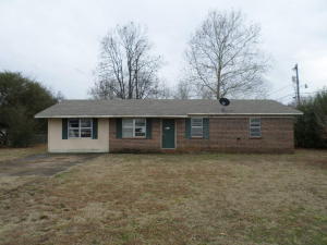 Great location close to town, work, shopping and schools. This is a three bedroom one and a half bathroom home approximately 1350 sft. Repairand reap the rewards, this one is a great value and is just waiting for it's new owner. Large lot, fenced in for your pets and or kinds. Call for yourshowing today!