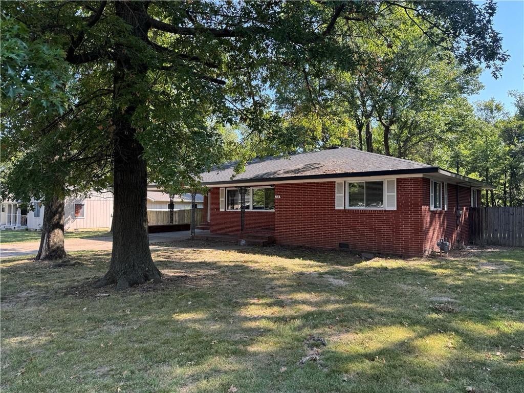 Charming home with modern updates.  Luxury vinyl flooring. New granite countertops, new sinks and faucets, stylish tile shower in main bath.  Large partially covered patio in huge back yard.  New heating and air and new roof.  This house may qualify for an Accessory Dwelling Unit.