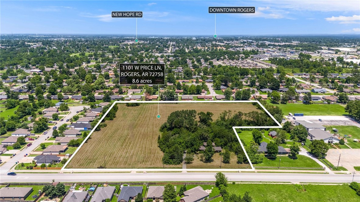 Excellent development opportunity with this 8.11 acre parcel that is zoned T4.2 (Neighborhood Node) in Rogers. Current zoning allows multiple types of multifamily, single family, and some commercial uses. Flat site with no wetlands or floodplain and 470' of frontage on W Price Lane with 4100 VPD traffic count.  Water and sewer on site.  Structure conveys with the property at no value.