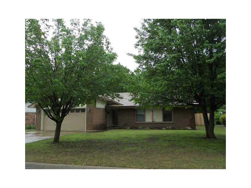 Well kept updated brick home with large living room, fireplace w/logs, vaulted ceiling in living room, tray ceiling in master, second living area, fenced yard, outbuilding with electric, new water heater.
