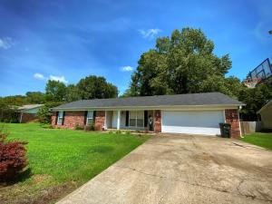 This is an absolutely PERFECT Family home- 3 bedrooms, 2 baths, with a super location, close to Pottsville Schools. This classic brick home has plenty of curb-appeal with a lovely landscaped lawn and a covered front porch. Contemporary living inside with a large family room that opens up to the kitchen and tiled dining area. The master bedroom has double closets and plenty of space. A double garage provides tons of room for your vehicles and tools. Out back is a covered patio with ceiling fan for you to enjoy morning coffee or afternoon BBQs. This patio overlooks an absolutely beautiful fenced back-yard with mature shade trees. You will feel like you've gone to the park, but have all the privacy you need and your own storage shed for all those summer toys. New roof new flooring,