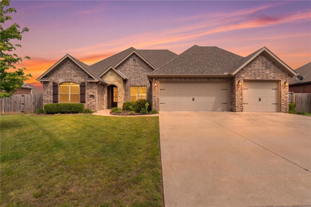 A desirable SW Bentonville location, 5803 SW North Fork St offers the perfect blend of comfort, style, and everyday convenience. This thoughtfully designed home features a spacious, open layout ideal for both quiet mornings and effortless entertaining. The kitchen flows seamlessly into the main living area, creating a natural gathering space, while large windows invite in abundant natural light. The primary suite provides a peaceful retreat, and the 3 additional bedrooms on the other side of the home offer flexibility for guests, work, or play. Step outside to a private backyard ready for summer evenings and weekend unwinding. Just minutes from top schools, parks, shopping, XNA airport and all that Northwest Arkansas has to offer—this is more than a home, it’s a lifestyle upgrade.