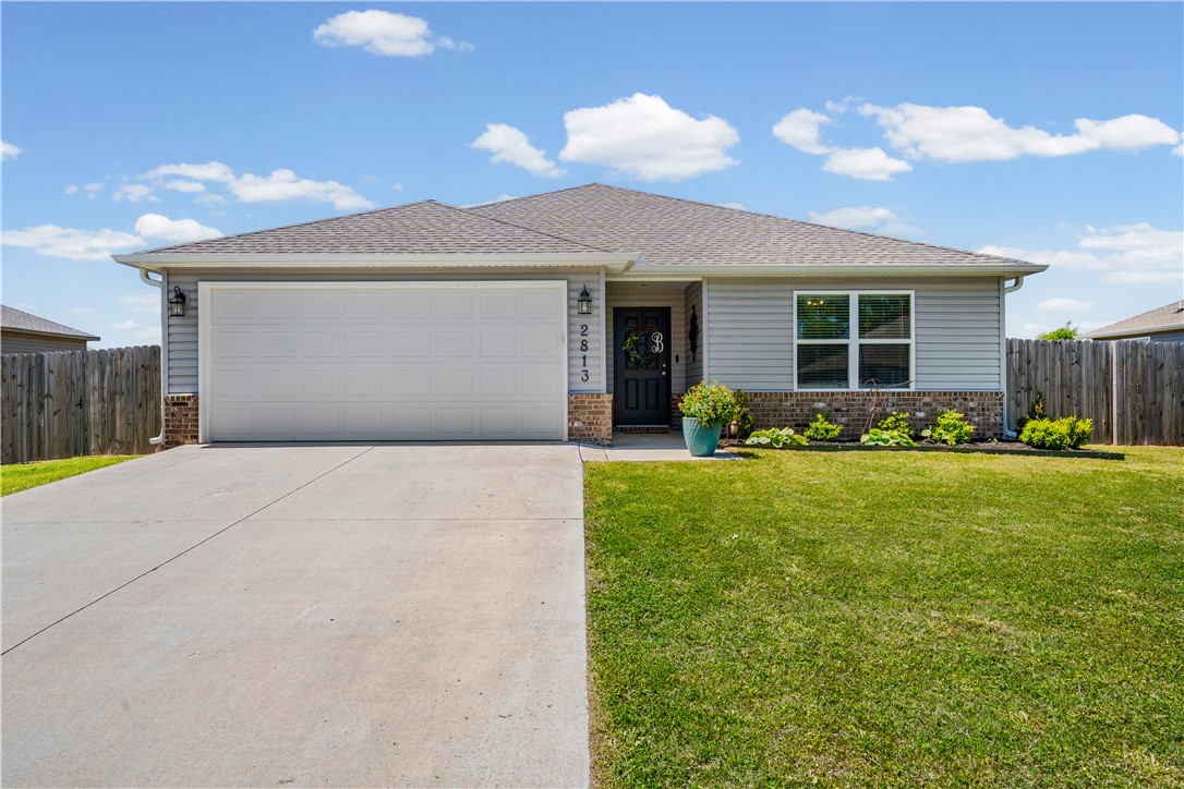 Welcome to this inviting 3-bedroom, 2-bath home designed for comfort, functionality, and easy living. Featuring double pane windows, blinds, and ceiling fans throughout, the home offers energy efficiency and year-round comfort. The kitchen stands out with custom painted cabinets and a stylish glass tile backsplash, creating a bright and modern feel. Enjoy a seamless entertaining flow both inside and out, perfect for gatherings of any size. The spacious backyard is a true highlight, complete with three fruit trees, a new storage shed with a convenient potting shelf, a covered concrete patio, pergola, and brick extension for added charm and usability. Both the single and double gates have been reinforced with metal framing for long-lasting durability. The primary suite includes a private en suite bath and walk-in closet. Ideal for families, first-time buyers, or investors alike.