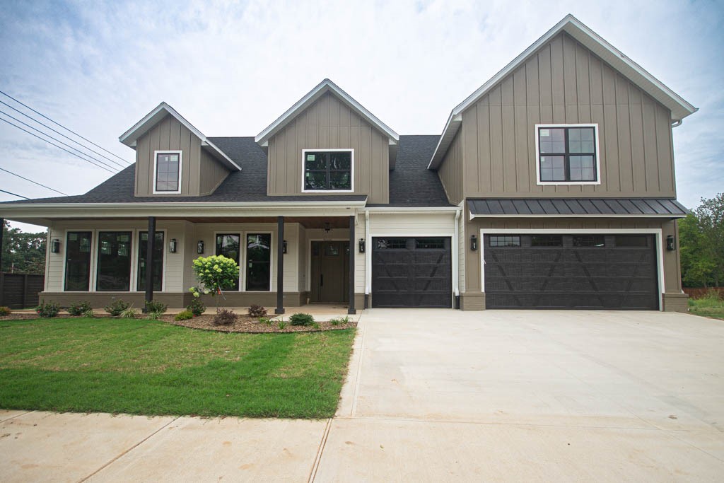 Located in the perfect location w/ easy access to Coler Mountain Bike Preserve trails, schools, downtown Bentonville & more. This stunning home is perfect for entertaining, situated on a large, professionally landscaped lot. Gourmet kitchen features stainless steel Café appliances, custom cabinets, floating shelves, two dishwashers, spacious island with upgraded granite countertops, working pantry & large dining area. Two-story living room, with its corner gas fireplace and wood floors, offers a warm & inviting atmosphere. Primary bedroom boasts wood flooring, custom stained tray ceiling & accent wall, leading to a spa-like ensuite with double sinks, soaking tub, walk-in tile shower & large walk-in closet with laundry room access. Study with French doors & custom stained beams, secondary downstairs suite ideal for a mother-in-law suite & large upstairs bonus room with built-in wet bar. Additional features include bike storage in the garage, bike washing station & spacious covered patio overlooking the backyard.
