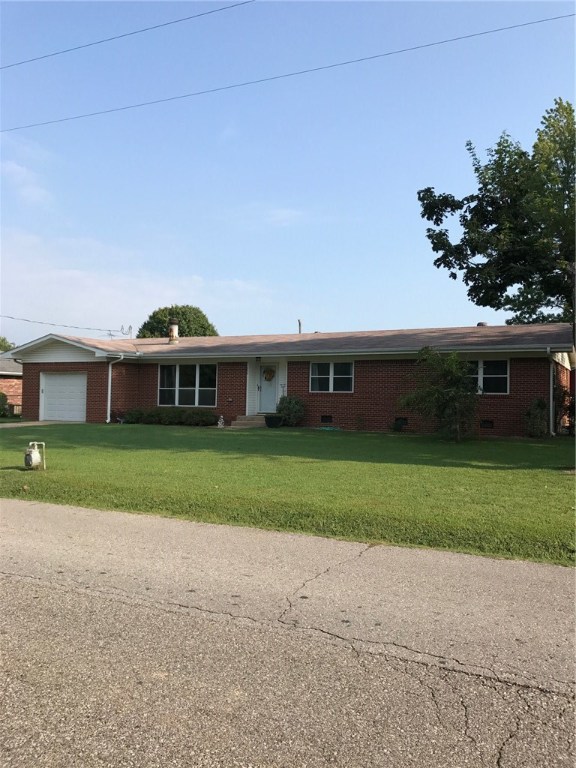 Very nice all brick, 4 Bd 2 Ba, home on 0.3 acres. Beautiful home that boasts wood and tile floors throughout. The eat in kitchen features new stainless steel appliances and ample cabinet space. The gorgeous living room has a wood burning fireplace. New appliances, new windows, new garage door opener, added insulation it attic, and a new 10x27 back deck. Above ground pool in back yard as well as a storage shed with electric! To many extra's to list. A beautiful home that is ready to move into. A must see!