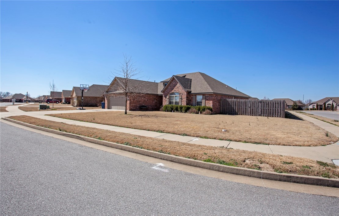This home has everything you are looking for! ALL Brick, Single level, Split floor plan located on LARGE corner lot in Terrific neighborhood. Spacious eat-in kitchen has breakfast bar, pantry & stainless steel appliances. Kitchen is open to living area - perfect for entertaining. 4 Spacious bedrooms. Crown molding. Beautiful wood flooring in entry, kitchen, living and dining areas. Upgraded light fixtures. Pet free home. Contact me for a private showing.