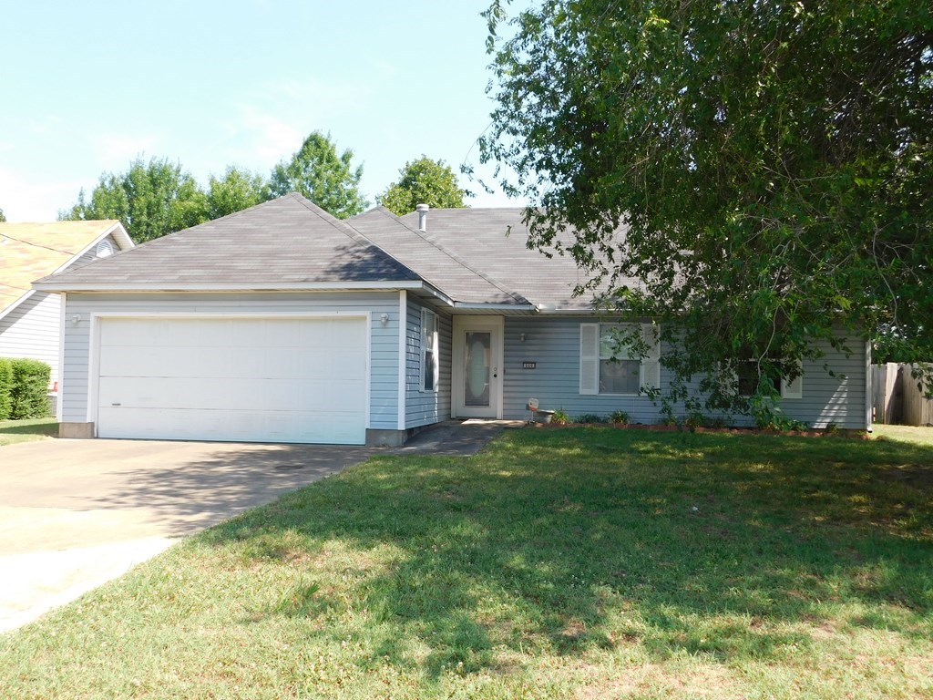 Nice home in a convenient location. Three bedrooms two full baths, sunroom, covered patio. Nice large open floor plan with a fireplace in living room. Located on a cul-de-sac street.