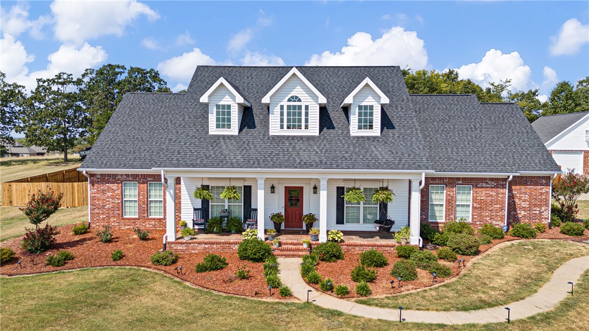Welcome to this stunning and remarkable home in the highly sought-after Greenbrier area! Situated on 4.38 acres with beautiful, manicured landscaping and a fully fenced backyard, this property offers the perfect blend of space, comfort, and charm. The main residence boasts 3,090 sq. ft. with a spacious open-concept layout, ideal for entertaining and everyday living. An additional office/study provides endless possibilities—home office, playroom, or flex space to fit your needs. The home is complete with a secure safe room, offering comfort and protection. The oversized two-car garage includes generous attic storage for added convenience. Another true highlight is the 931 sq. ft. detached shop featuring a half bath and upstairs living quarters—perfect for a guest suite, hobby space, or a private retreat. This home has been cared for with love and is ready to welcome its next family. Don’t miss the opportunity to own this beautiful dream property in Greenbrier!