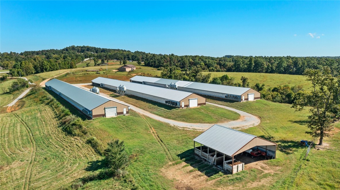 BIO-SECURE - DO NOT ENTER WITHOUT PERMISSION - APPOINTMENT ONLY!
3 Breeder hen house operation on 15 ac mol with a location for a mobile (septic and water in place), the houses are all new (inside) and have a 15-year contract in place! This is a great producing farm, and it is ready for a new owner! Call today! Welcome to the option to live/work at home!
1 house is brand new; other 2 mostly original with all updates completed. PREMIUM PAY. house included on mls 1324452