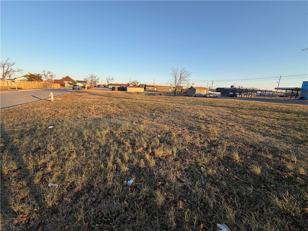 Exceptional .56 acre development lot located directly behind 919 W Walnut Street in Rogers, one of the area’s most visible & heavily traveled streets. This highly desirable parcel offers outstanding exposure & accessibility, making it ideal for multi-family development. Engineering plans are already in place for townhomes or duplexes, allowing a buyer to move forward with confidence & reduced upfront planning time. All utilities are on site, further streamlining the development process. Situated in an area surrounded by established neighborhoods, retail, & schools, this property presents a rare opportunity for builders or investors seeking a well-located, development-ready site in Northwest Arkansas.