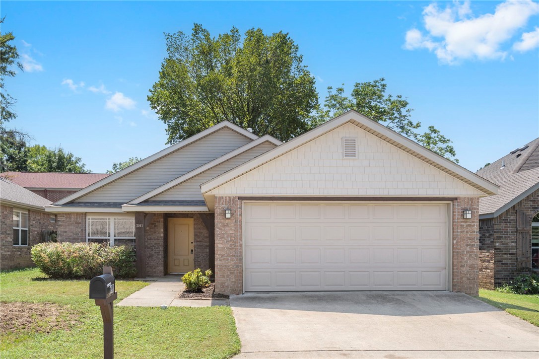 Get ready to fall in love with 281 E. Madrid Street, a FRESHLY-UPDATED 4-bedroom, 2-bath Fayetteville beauty that combines style, comfort, & an unbeatable location! Just minutes from the University of Arkansas & the abundant shopping and dining along Business 71, this home is also minutes to the Razorback Greenway, where miles of trails are waiting for you to enjoy the outdoors. Inside, with new paint throughout, the open living spaces and Primary Suite feature NEW luxury vinyl plank flooring that add both durability & character, while brand-new carpet brings fresh comfort to the three non-primary bedrooms. The kitchen is the true heart of the home with sleek granite countertops & a refrigerator included with the sale, making move-in day that much easier. Step outside to enjoy fresh landscaping that boosts curb appeal & creates a welcoming first impression. This property delivers the perfect mix of Fayetteville charm, modern upgrades, and location that simply can’t be beat. New roof in 2020. Schedule a tour today!
