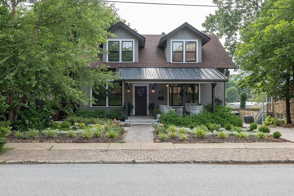 Gorgeous renovated craftsman home that oozes charm and character. Located in the historic district area/entertainment district, Wilson Park, the U of A, the square, Dickson Street, and the Greenway Trail. Built in 1939 and renovated in 2011 by Mark Zweig, and again in 2022 by current owner, his home drips sophistication and is perfectly set up to entertain in multiple areas and decks/patios.  Original woodwork throughout, high ceilings, updated roof, electrical, plumbing throughout most of the home, 2 laundry areas (2nd floor and basement); refinished floors and new paint inside and out. Relax on the adorable front porch, the wrap around deck in the heated dipping pool, or in the party shed, or by the flagstone patio and fire pit.  So close to everything, you will barely need a car!  Downtown General zoning allows home office. A carport or single car garage can be added to side of home.  This property has an active type 1 short term rental (STR) permit for owner-occupied airbnb or vrbo.  Come take a look!