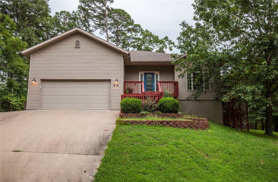This well maintained home will make a great starter home or investment property.  The home sits on a large corner lot. The home features two bedrooms and two full baths with an open concept, Tall ceilings through-out, Large utility room with over-sized pantry.  Easy access to US 71N.