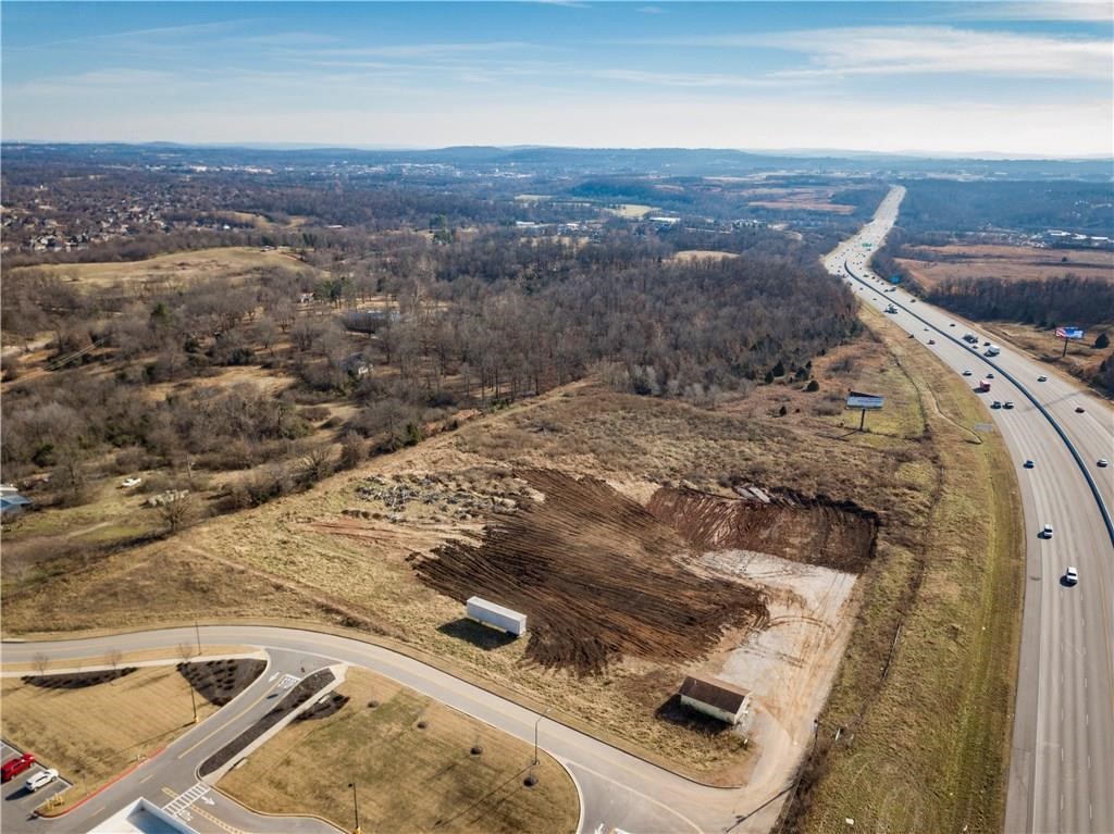For sale is a 7.92-acre parcel in a prime location in Springdale. The property is situated south of Walmart Neighborhood Market, adjacent to Don Tyson Parkway and the Highway 49 corridor. The seller has finalized and secured approval for a mini-storage facility on this parcel. The plans and rights for the facility will be conveyed with the sale of the parcel. Additionally, there is an additional 5 acres that can be negotiated as an extension to the purchase.