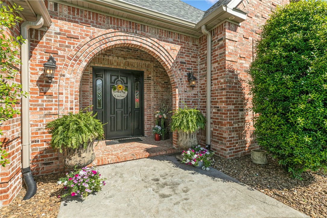 Looking for your dream home close to the center of everything?
Welcome to Stonebriar. Here you'll enjoy peace and quiet, beautiful homes on large lots, and a close proximity to Bentonville and Centerton. 11232 Stonebriar has everything you're looking for, 1.51 acres, 4 bedrooms. There is nothing ordinary about this well cared for, generously proportioned, comfortable, family friendly, home with its brick exterior, manicured lawn and inviting patio and pool area (vinyl liner type pool, no heater) with an outdoor fireplace and kitchen.
Many quality updates in the last few years including kitchen remodel, new granite counter tops, HVAC units (3 heating, three cooling) updated lighting, whole house water softener,