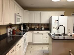 Nice 2 Bedroom 2 Bath Condo; open floor plan with Sun Room; gated community for Seniors 55 years or older