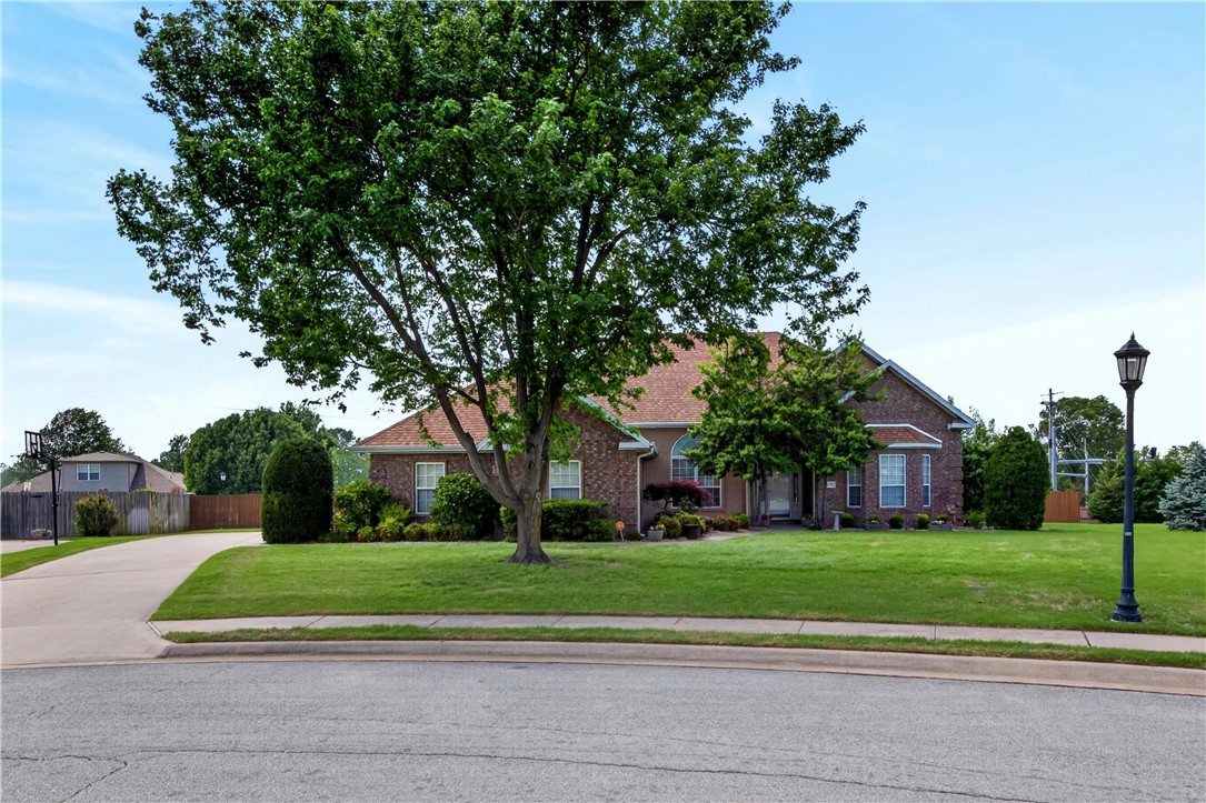Beautifully maintained 4-bedroom, 3-bath home on a spacious .47 m/l acre corner lot in a prime Springdale location. Enjoy direct access to the Razorback Greenway and walkability to Hunt Elementary and JB Hunt Park Lake Springdale Trailhead. This property offers both convenience and privacy with mature landscaping and large Leyland cypress surrounding the backyard retreat.

The outdoor space is designed for relaxing and entertaining, featuring a private 16x40 in-ground fiberglass pool (8 ft deep), covered pergola, and covered back patio. Inside, the home offers a comfortable layout with two gas fireplaces, creating warm and inviting living spaces.

With easy access to I-49, this home combines location, lifestyle, and outdoor living in one exceptional package.
Up to $3000 in preferred lender credits offered