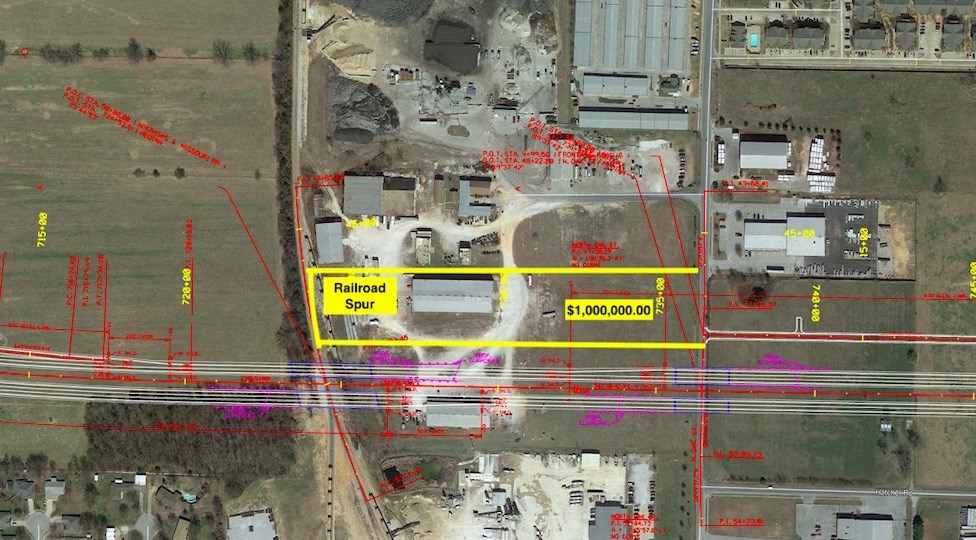 Future 412 Bypass frontage.  Centrally located, railroad spur on property, security gate around frontage.  Perfect for any commercial business needing acreage with an existing warehouse or rail access.  Priced to sell.  Also listed as ML:1107702