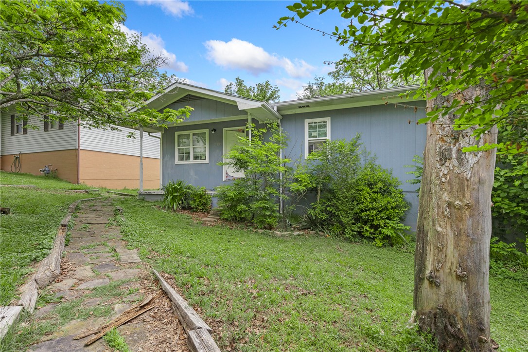 This 3 bedroom, 1 bathroom home offers 1,040 sq ft on the main level with a layout that feels comfortable and practical. The bedrooms are all nicely sized, laminate flooring throughout most of the home and the kitchen features a gas range and dishwasher ready for home-cooked meals. Downstairs, the walkout unfinished basement (1,040 sq ft) gives you plenty of extra storage space, a garage area, and the opportunity to expand your living space in the future. With a separate entrance from the alley behind the home, the basement adds flexibility and convenience.  Outside, you’ll appreciate the fenced area that’s perfect for pets or kids to play and the back deck overlooking the spacious yard...bonus; no neighbor directly behind you! Whether you’re looking for your first home, an investment property, or a place you can make your own over time, this home has plenty of potential and won't last long at this price!