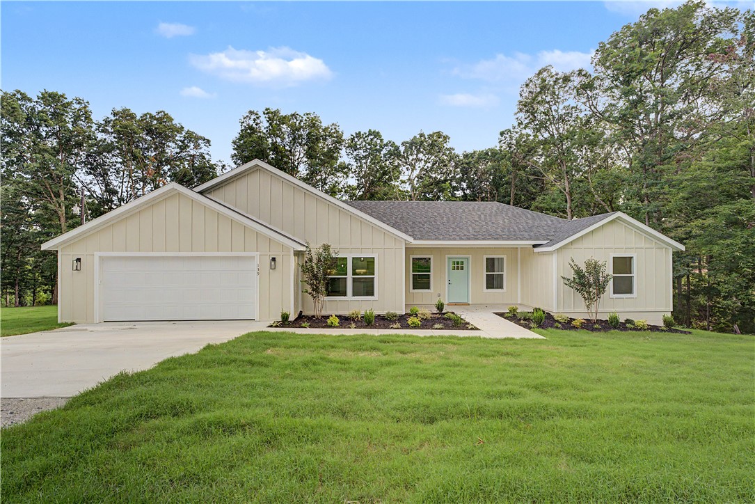 Check out this new construction gem on 2.2 acres in Hindsville, AR. 1,968 sqft, 3 bedroom, 2 bathroom, open concept floor plan has a blend of luxury and comfort. Brazilian marble countertops throughout the house. Oversized 2 car garage and oversized covered back patio. Vaulted ceilings with pine beams in the living room and primary bedroom. The 2.2 acre lot consists of massive mature red and white oak trees, and a gorgeous view looking to the south. The home comes with a 1 year builders warranty.