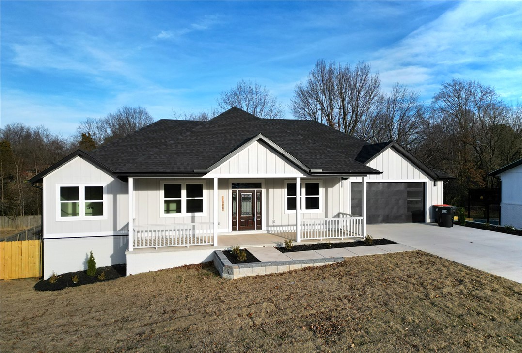 This beautifully crafted home showcases high-end finishes and thoughtful design throughout. The kitchen is a true standout, featuring custom cabinets with soft-close drawers, quartz countertops, high-end appliances, a custom backsplash, a large island perfect for entertaining, and a walk-in appliance pantry. LVP flooring flows throughout the home, with tile in the bathrooms and laundry room. The primary suite offers a relaxing retreat with a custom walk-in closet, freestanding soaking tub, and beautifully finished shower. Beam accents add warmth to the living room, entryway, and primary bedroom, while custom carpentry is found throughout. You’ll also enjoy a separate office with an accent wall, a spacious laundry room with sink, foam insulation, Hardie board exterior, ceiling fans and LED lighting in all bedrooms, a welcoming front porch, covered back deck, and a large backyard ideal for everyday living or entertaining. Call now to schedule your private showing.