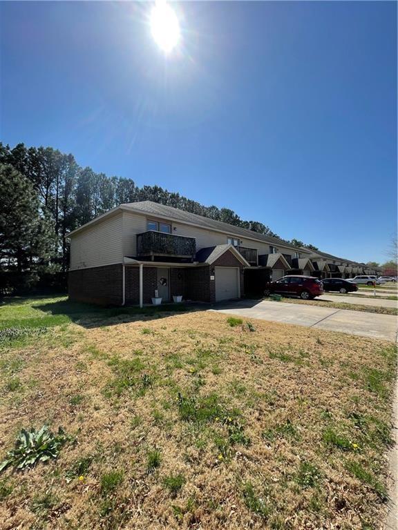 Great townhouse/condo with lots of extras. Spacious living room & kitchen with dining area. Upstairs there are 2 bedrooms & 2 baths with a half bath downstairs. 1 car garage. Conveniently located & close to U of A.