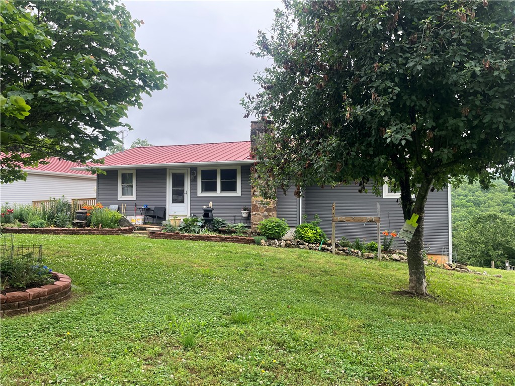 Peaceful, country living on this beautiful 31.68-acre rural property in Rae Valley. The two-story home features approx. 1,100 sq ft per floor, providing a spacious layout. The main floor offers an open living, dining, and kitchen area including a spacious master bedroom and full bathroom.  The walkout basement has two additional bedrooms and a full bathroom, creating plenty of room for family, guests or flexible use as an office, hobby and storm shelter. Step outside onto the newly built deck to relax and take in the beautiful scenic views, an ideal spot for morning sunrise, coffee, evening sunsets and abundant wildlife roaming the property. There’s also a 24x30 insulated detached garage perfect for vehicles, equipment or a workshop and a 16x20 insulated storage building. If you’re looking for a quiet homestead, recreational property or a place to enjoy rural living with room to roam, this property offers it all, just minutes from White River.