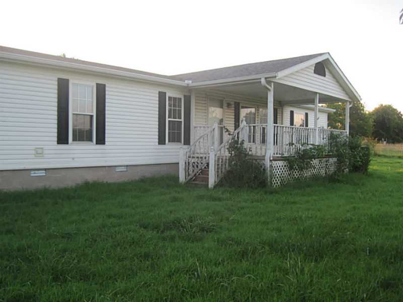 2 level acres fenced & cross fenced. 2 living areas w/ add on man cave or game room, split floor plan. Covered front porch, feels secluded!  AS IS with no disclosures.  All offers subject to final corporate approval, must be pre approved or have proof of funds.  Earnest money required with all offers.