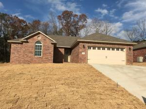 STAGED TO INSPIRE A BUYER--MAKE YOURSELF AT HOME in this lovely 3 BR, 2 BA brick home featuring spacious kitchen with beautiful granite countertops, hardwood flooring in the living room and a well-designed master suite. Walk-in closets in all three bedrooms!